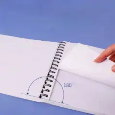 Spiral notebook pages turning 180 degrees, illustrating flexible binding and easy page turning.