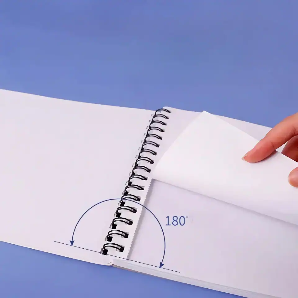 Spiral notebook pages turning 180 degrees, illustrating flexible binding and easy page turning.