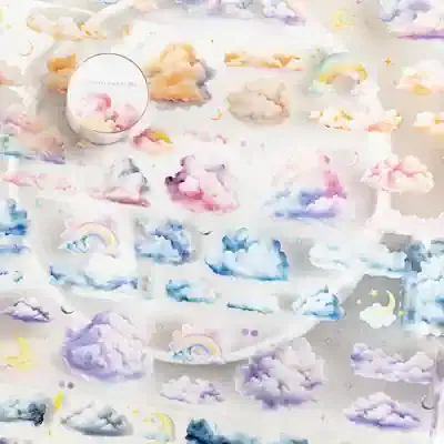 Pink, purple, blue, and yellow cloud-themed wall art and decor for nursery or children's room, featuring rainbows, moons, and stars for a whimsical and dreamy atmosphere.
