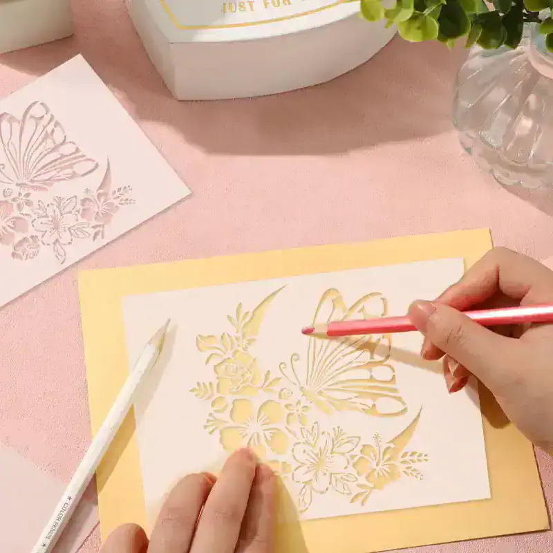 Intricate paper cut butterfly and floral design art process at Monalisa Store, showcasing craftsmanship and creativity for personalized paper artwork and decor.