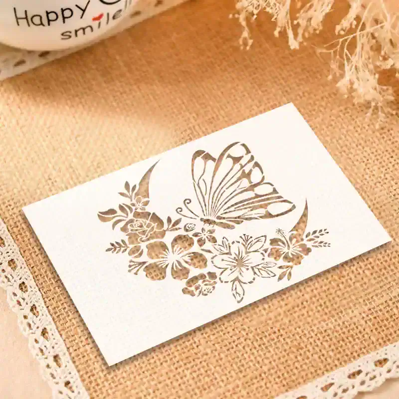 Delicate butterfly and floral paper cutout at Monalisa Store, ideal for elegant craft projects and personalized stationery.