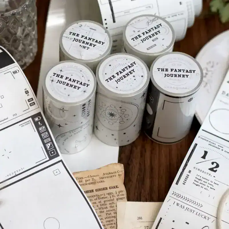 Fluffy white candles labeled "The Fantasy Journey" for home decor and aromatherapy, perfect for creating a relaxing atmosphere and enhancing interior aesthetics.