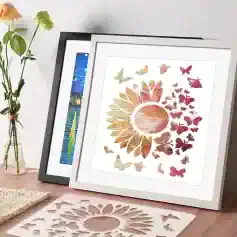Vibrant butterfly and sunflower wall art print displayed on a desk with flowers in a glass vase, perfect for modern home decor and art lovers.