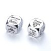 Shiny silver dice with engraved labels and icons representing American cuisine, comedy, drama, and barbecue, ideal for food and entertainment enthusiasts looking for unique themed accessories.