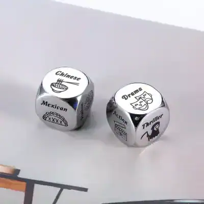 Shiny metal dice with playful labels for Chinese, Mexican, drama, and thriller genres, ideal for movie night or game night, featuring humorous and entertainment-themed designs.
