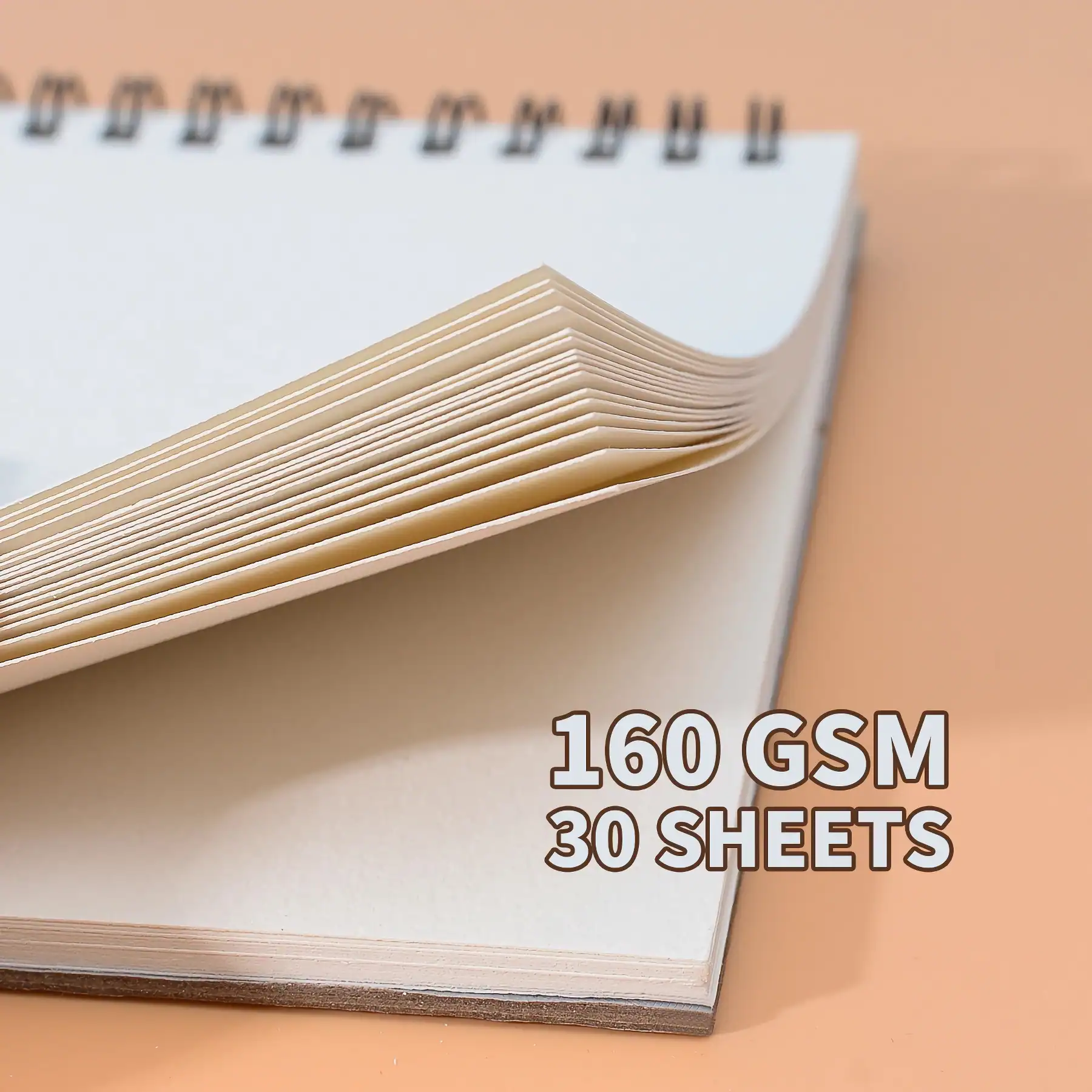 Thin cream-colored notepad with 30 pages, ideal for note taking and planning, featuring 160 GSM quality paper for smooth writing experience. Perfect for office and personal use.