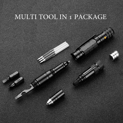 Multiple black tattoo and piercing tools in a kit on a textured black background, versatile and portable for professional body art applications.