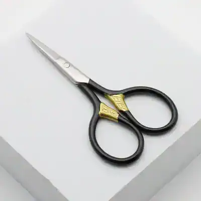Precise medical scissors with black and gold handles, ideal for surgical or cosmetic procedures at Monalisa Store.