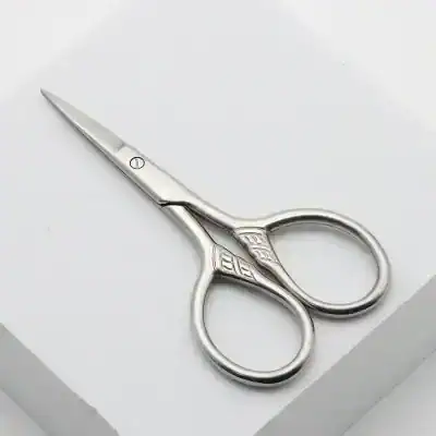Sterile surgical scissors for precise medical procedures and eye surgeries, made of high-quality stainless steel, ideal for professional ophthalmology and cosmetic treatments.
