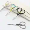 Color-coded surgical scissors for precise eye procedures, essential for ophthalmology and eye care professionals.