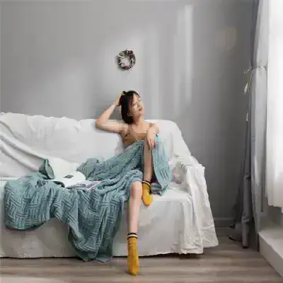 Comfortable woman relaxing on Monalisa Store sofa, blending modern aesthetic with cozy style, perfect for your skincare and aesthetic needs, with natural light enhancing a relaxing atmosphere.