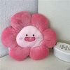 Soft pink flower-shaped plush pillow with a cute smiling face, ideal for children's bedrooms or gifts, available at Monalisa Medical Store.