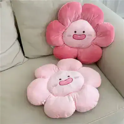 Flower-shaped plush cushions with cute smiling faces, ideal for children's room décor or cozy lounge area, available at Monalisa Store for adorable home accessories.