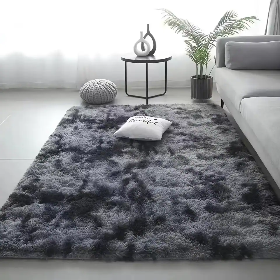 Luxurious dark gray plush area rug with a soft, shaggy texture, perfect for modern living room decor, creating a cozy and stylish ambiance.