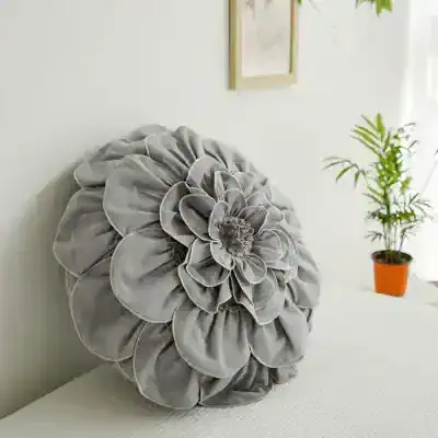 Luxurious decorative velvet flower pillow for sofa or bed, elegant home accessory, soft plush cushion for living room decor.