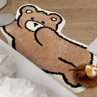 Cute bear-shaped plush rug for kids' bedrooms or play areas, adding cozy charm and warmth to any space with soft, plush texture.