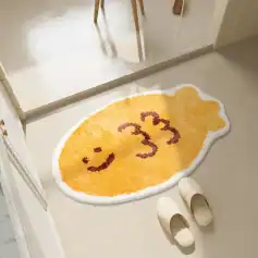 Smile emoji-shaped rug with a happy face design at Monalisa Store for opt, cozy home decor, welcoming entrance mat.