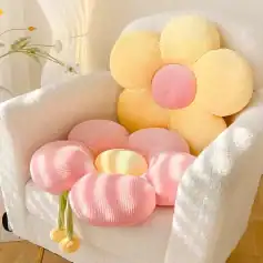 Bright pastel flower-shaped cushions in pink and yellow, perfect for home decor or cozy seating at Monalisa Medical Store.