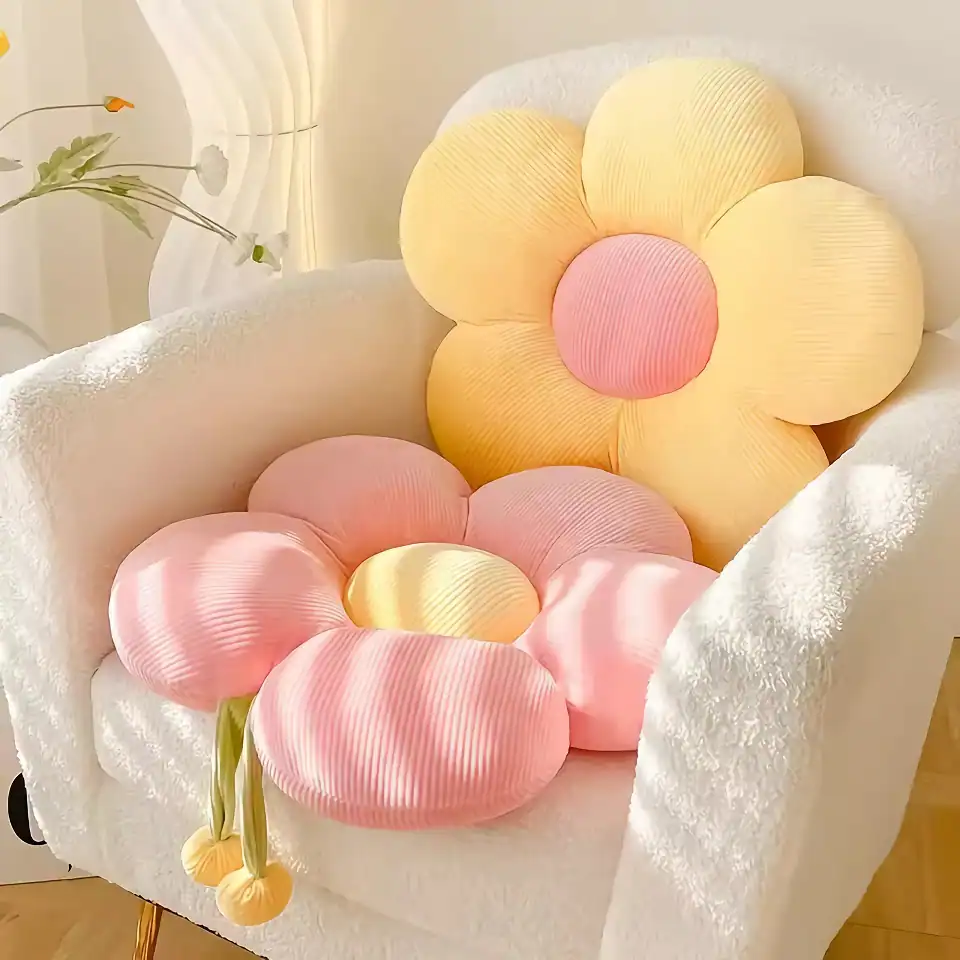 Bright pastel flower-shaped cushions in pink and yellow, perfect for home decor or cozy seating at Monalisa Medical Store.