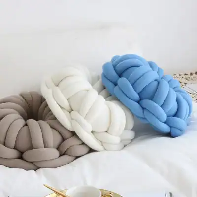 Soft knot pillow set in beige, white, and blue, perfect for home decor and relaxation. Plush, stylish, and comfortable, ideal for adding a cozy touch to living spaces or bedrooms.