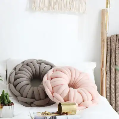 Ultra-soft plush knot pillows in pink and gray, perfect for cozy bedroom decor, at Monalisa Store, modern home accessories for comfort and style.