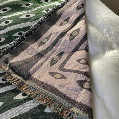 Luxury woven handwoven throw blanket featuring a modern geometric pattern, perfect for home decor and comfort at Monalisa Store.