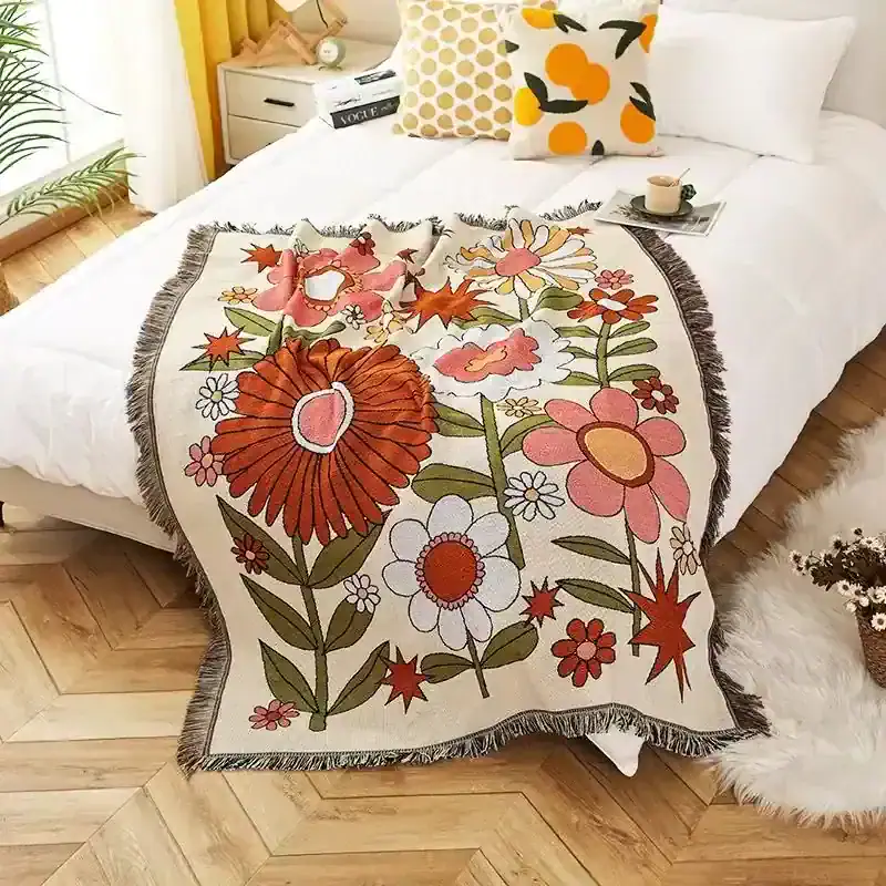 Bright floral blanket on a cozy bedroom bed with colorful pillows, creating a vibrant and inviting space with Monalisa Store's stylish home décor options.
