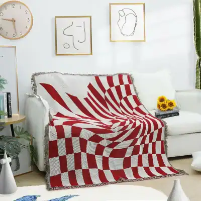 Red and white optical illusion throw blanket, modern home decor, trendy living room accessories, geometric pattern blanket, Monalisa Store opt art textile, cozy stylish throw for sofa or bed.