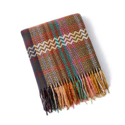 Colorful plaid scarf with fringe, perfect for fall and winter fashion accessories.