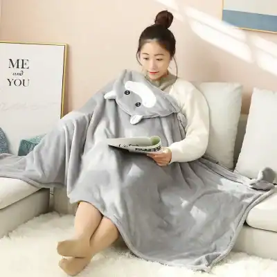 Soft plush shark blanket with hood, perfect for cozy lounging and warmth, featured in a modern living room setting at Monalisa Store.