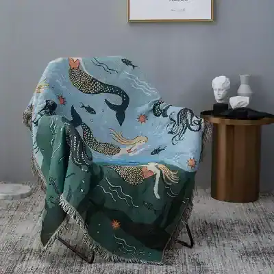 Luxury mermaid-themed throw blanket with ocean creatures and vibrant colors, perfect for home decor or gifting, available at Monalisa Store.