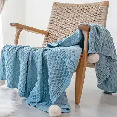Luxury blue knit throw blanket on wooden armchair for cozy home decor - Monalisa Store.