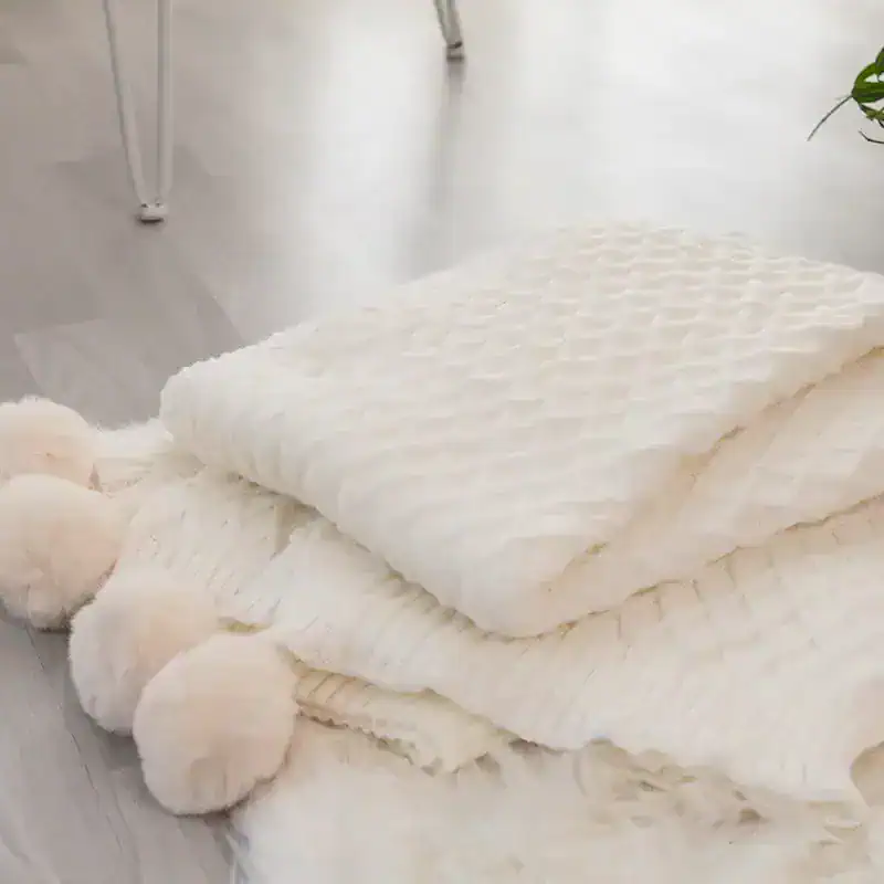 Luxury white plush blankets and pillows for sleep and comfort, high-quality bedding accessories from Monalisa Store.