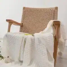 Soft beige woven armchair from Monalisa Store, perfect for modern home decor and comfort.
