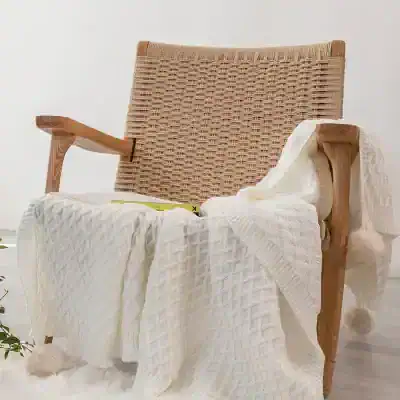Soft beige woven armchair from Monalisa Store, perfect for modern home decor and comfort.