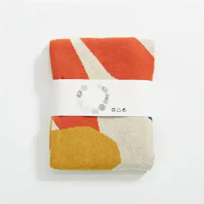 Vibrant patterned fabric towels with modern abstract designs, ideal for stylish home decor and functional use in bathrooms or kitchens.