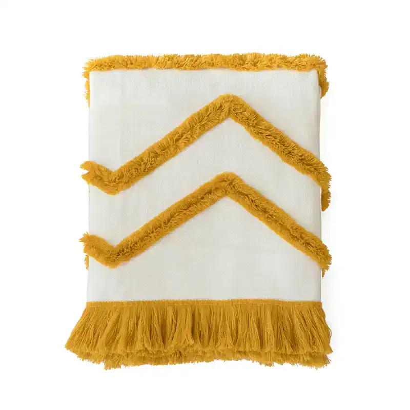 Vase with yellow fringe and chevron accents, decorative home decor piece, crafted with plush fabric and elegant design for stylish interior enhancement.