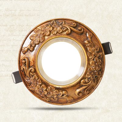 Ornate wooden round mirror with floral carvings, ideal for stylish home decor and interior design accents.