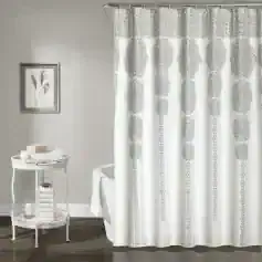 Elegant white shower curtain with intricate gray patterns for stylish bathroom decor.