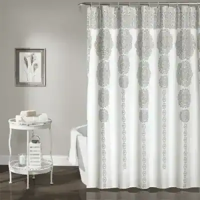 Elegant white shower curtain with intricate gray patterns for stylish bathroom decor.