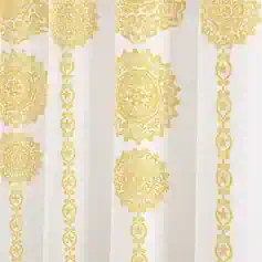 Elegant Golden Ornamental Patterns on White Curtain for Home Decor and Interior Design.