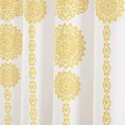 Elegant Golden Ornamental Patterns on White Curtain for Home Decor and Interior Design.
