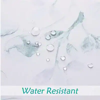 Water-resistant fabric with water droplets on smooth surface, showcasing durability and waterproof features for skin and beauty products.