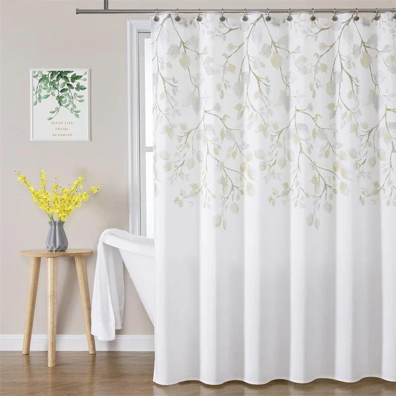 Soft white botanical curtain with leaf pattern for window decor in bedroom or living room, ideal for creating a light and airy atmosphere.