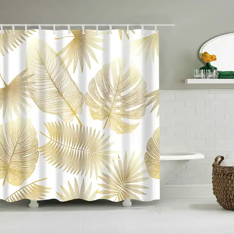 Vibrant tropical leaf shower curtain with gold accents, perfect for enhancing bathroom decor with a luxurious and exotic touch.