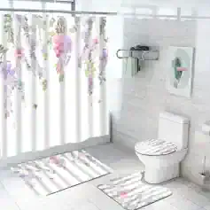 Flowery bathroom shower curtain and accessories with matching rugs, white modern toilet and decorative wall art, light and airy space, perfect for stylish home decor and bathroom updates.