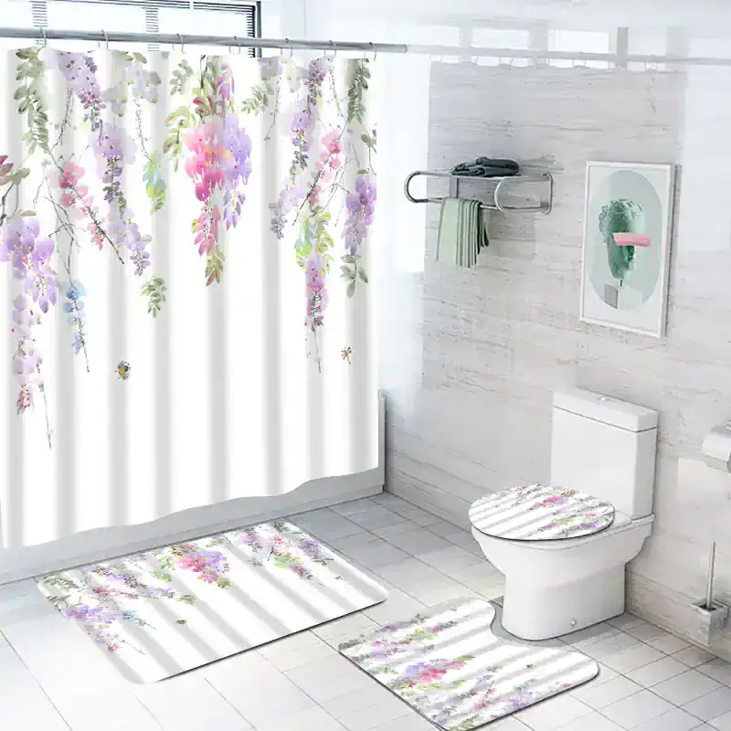 Flowery bathroom shower curtain and accessories with matching rugs, white modern toilet and decorative wall art, light and airy space, perfect for stylish home decor and bathroom updates.