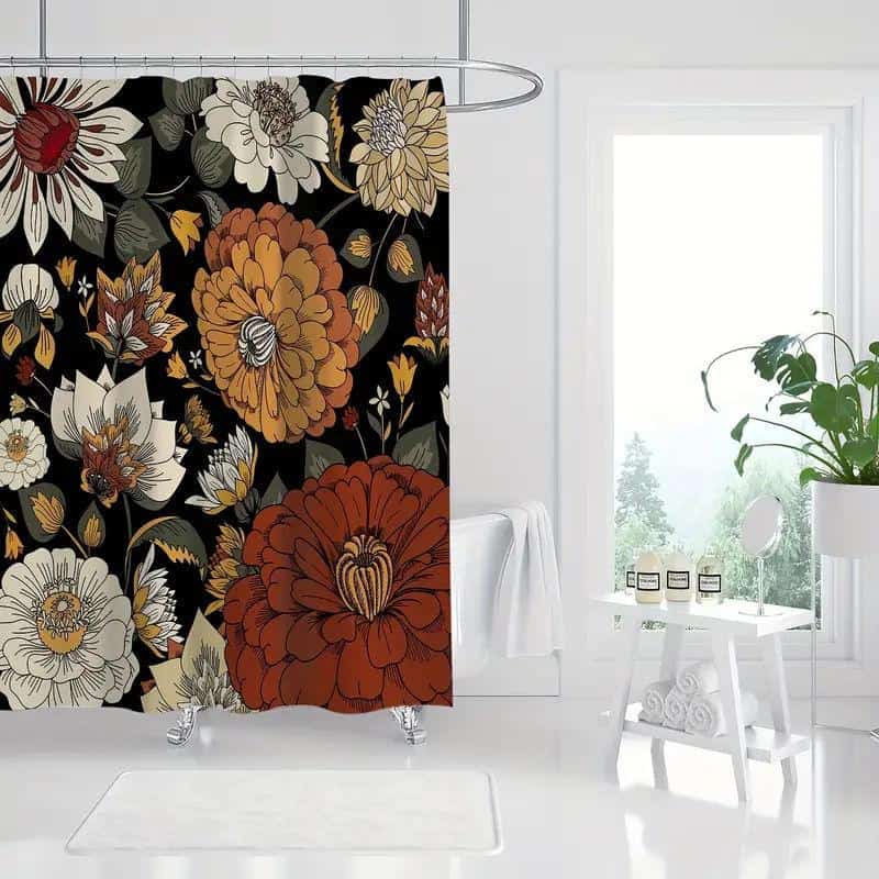 Vibrant floral shower curtain with bold black background, perfect for modern bathroom decor, featuring large orange, beige, and white flowers with intricate details.