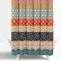 Linen fabric with colorful geometric and floral patterns in multiple strips, perfect for home decor, curtains, or DIY craft projects.