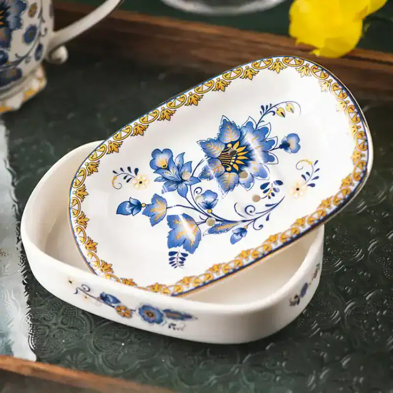 Elegant porcelain dish with intricate blue and gold floral patterns, ideal for serving or decoration, from Monalisa Store’s collection of fine tableware.